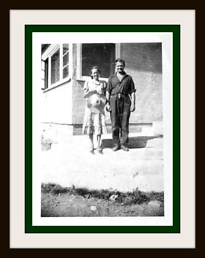 Margaret & George Whittaker on the steps of their newly built home in Maple Bay